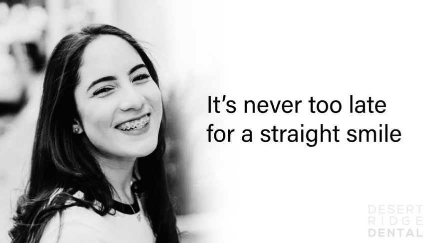 a young woman with long, dark hair and braces, smiling brightly. The photo is black and white, and she is positioned on the left side of the image. The right side of the image contains the text "It's never too late for a straight smile" in black letters. The logo "DESERT RIDGE DENTAL" is located in the lower right corner.